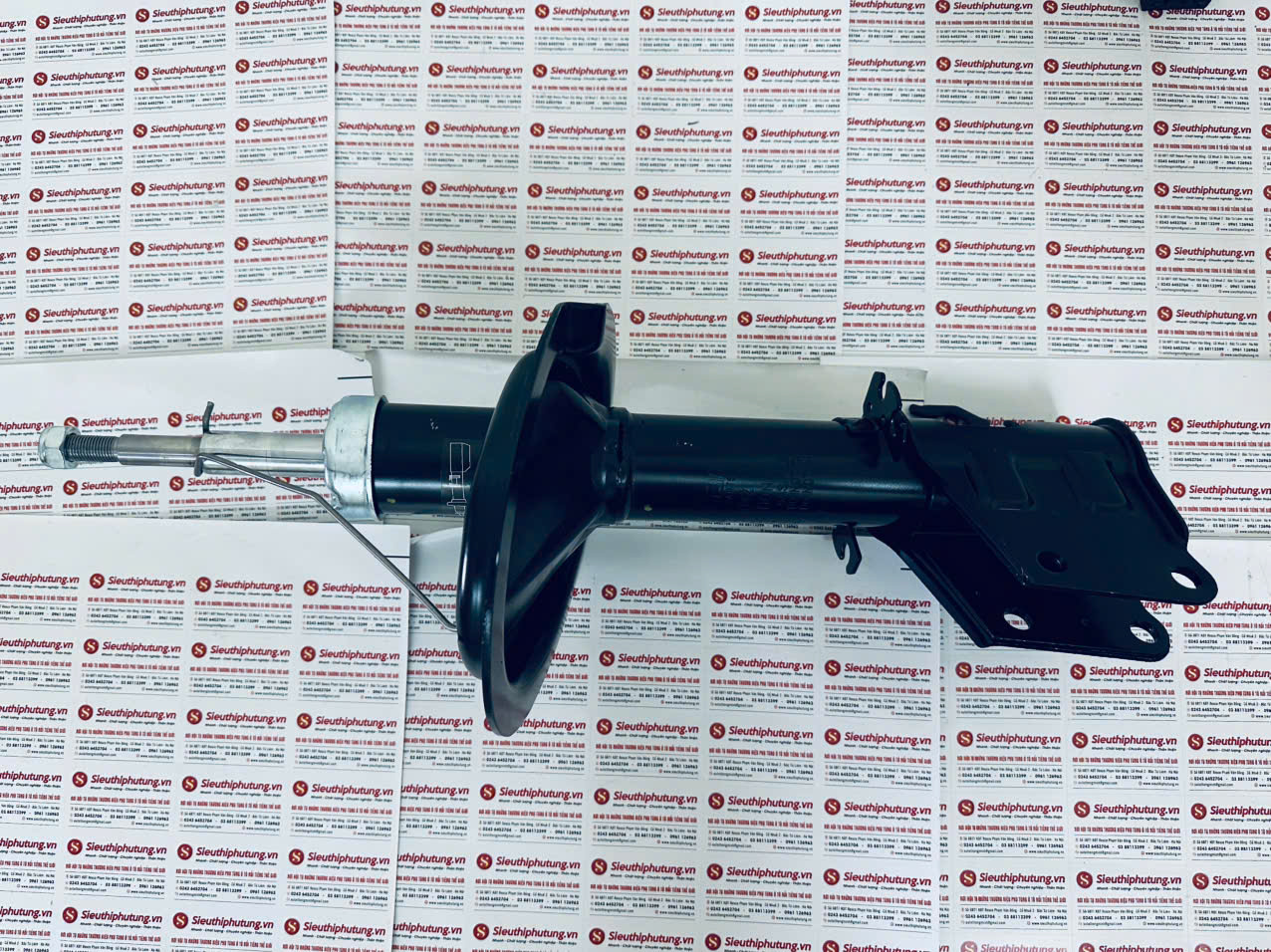 Giảm sóc trước trái Fiat Siena 2004